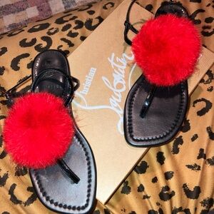 Christian Louboutin Black Sandals with Vibrant Red Pom Poms